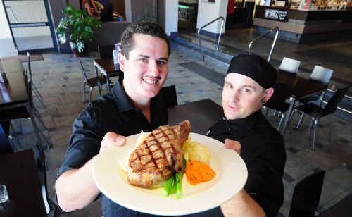 Plantation Hotel venue manager Anthony Brady, left, and head chef Neville Mott with a mouthwatering 300-gram ribeye. Plantation Hotel venue manager Anthony Brady, left, and head chef Neville Mott with a mouthwatering 300-gram ribeye.